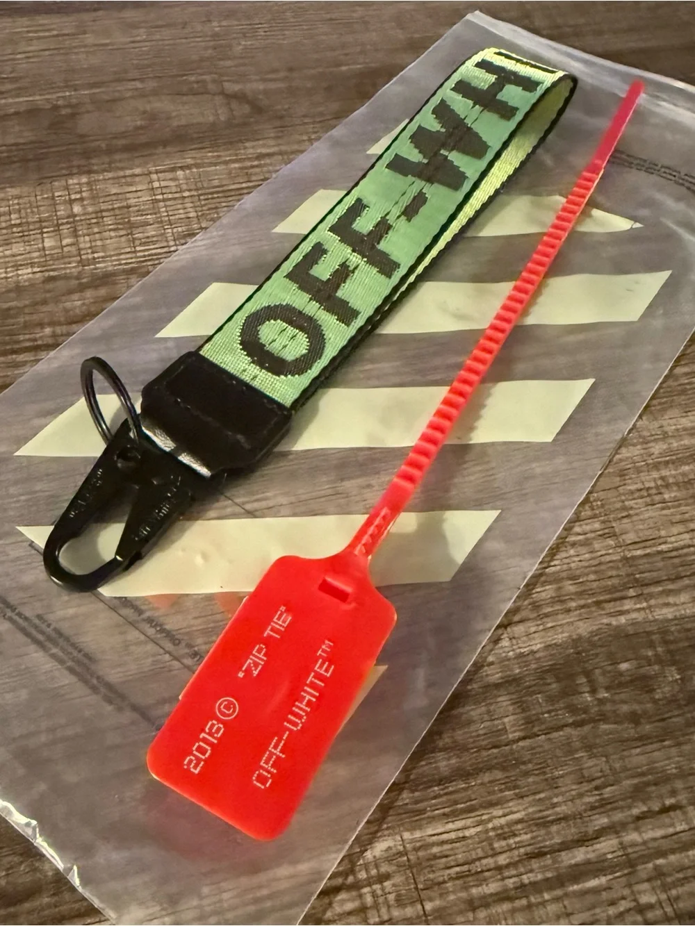 Off-White Neon Green Logo Key Strap with Red Zip Tie